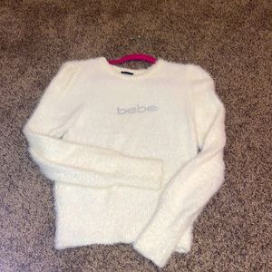 white BEBE sweater